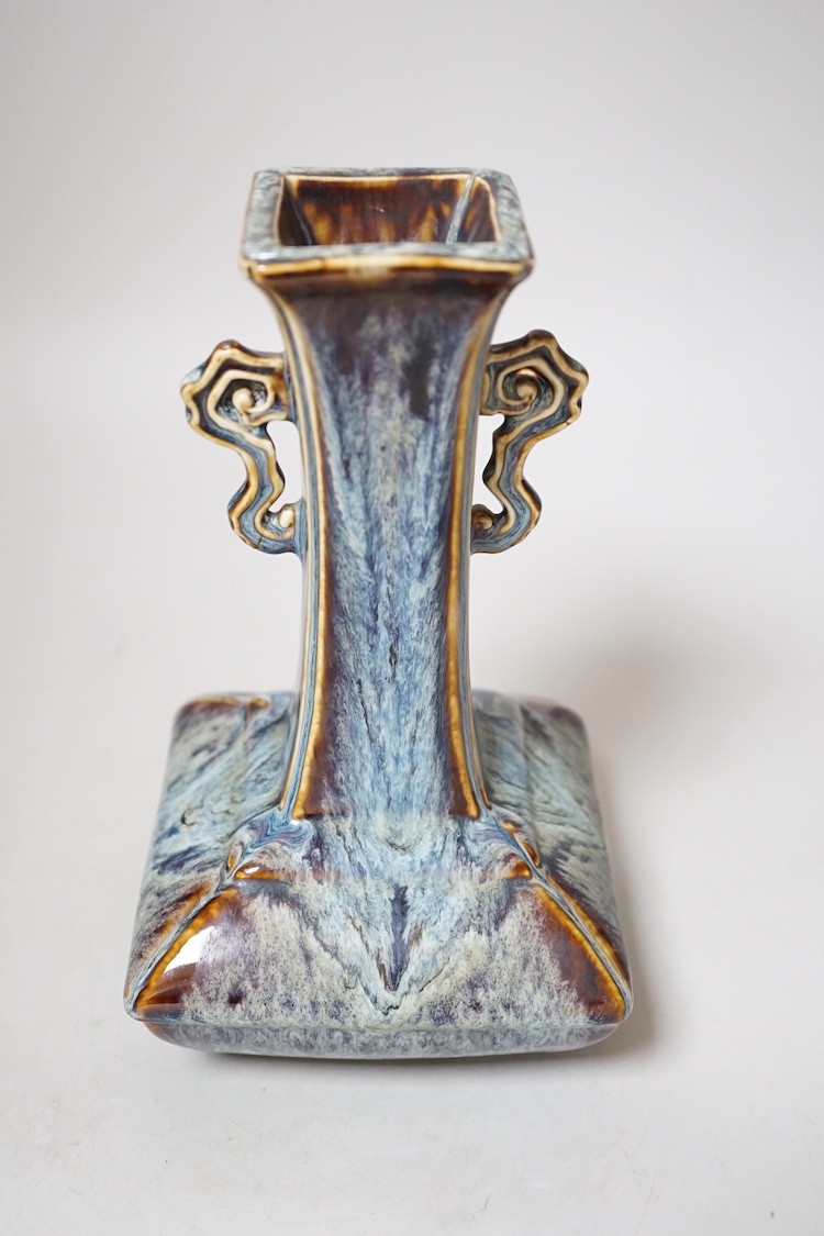 A Chinese Shiwan two handled vase, 23cms high